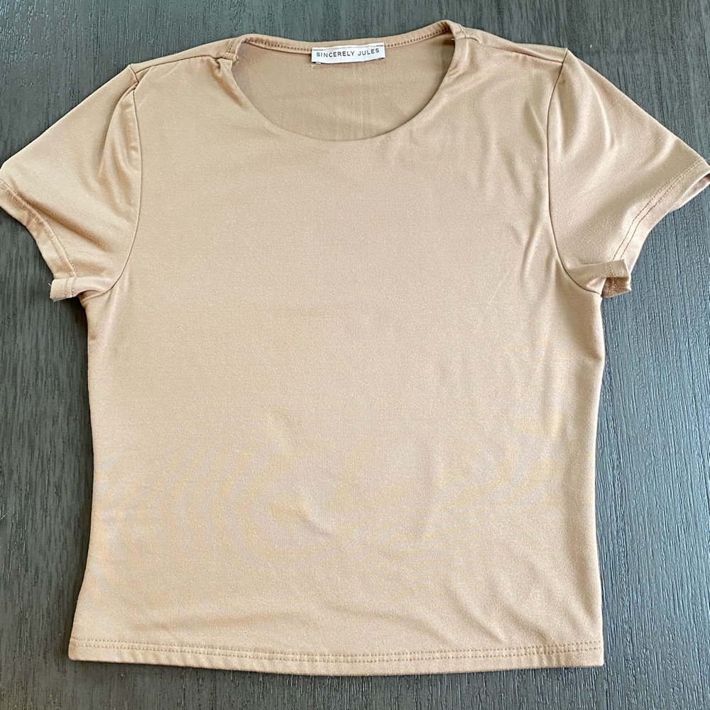 Taupe colored short sleeve “Sincerely Jules” t-shirt